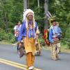 Byron Brown, Chief Sun Rise of the Wiquapaug Eastern Pequot tribe and a descendent of Lighthouse founder James Graughham, walks in the Barkhamsted Lions Parade Saturday