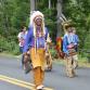 Byron Brown, Chief Sun Rise of the Wiquapaug Eastern Pequot tribe and a descendent of Lighthouse founder James Graughham, walks in the Barkhamsted Lions Parade Saturday